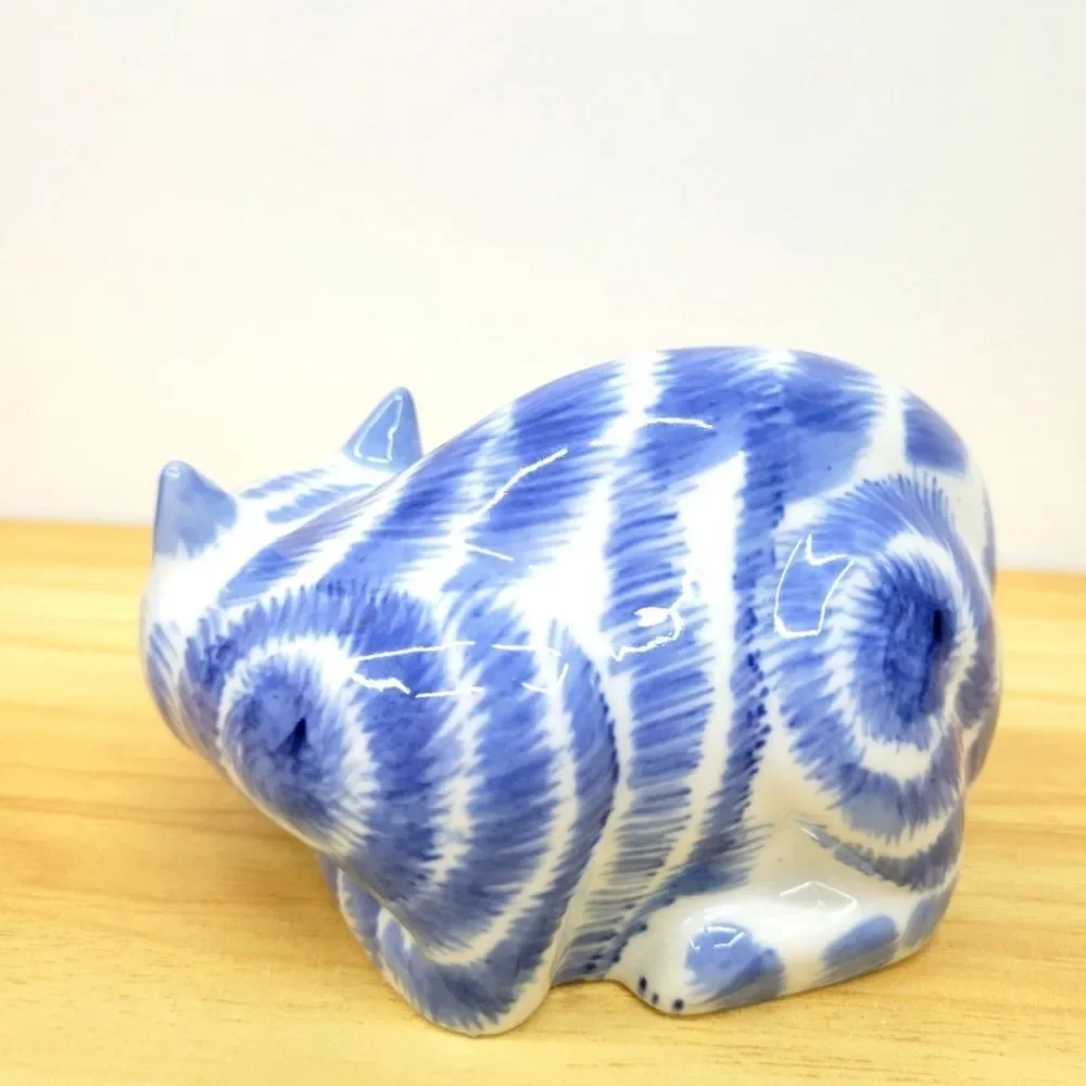 Blue & White Porcelain Cat Figurine – Curled Sleeping Pose
